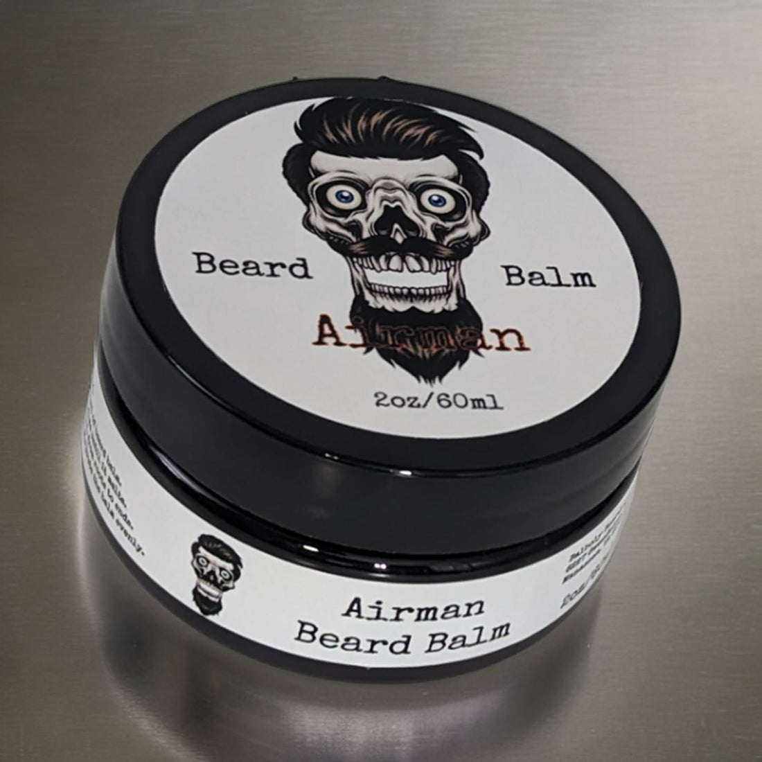 Airman Beard Balm, black jar with the white Balboly label reading Beard Balm, Airman, 2oz/60ml